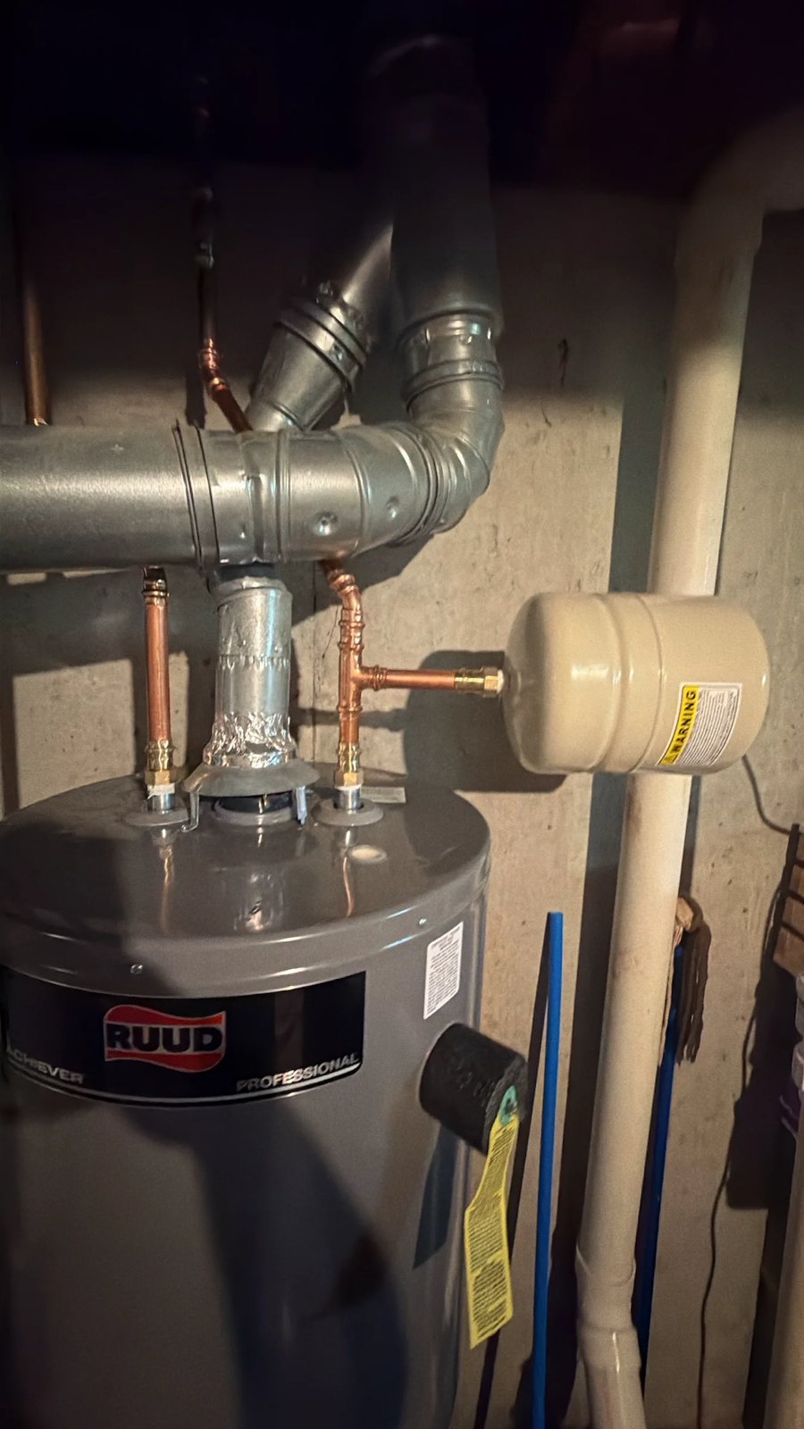 Gas water heater with new vent pipe and thermal expansion tank